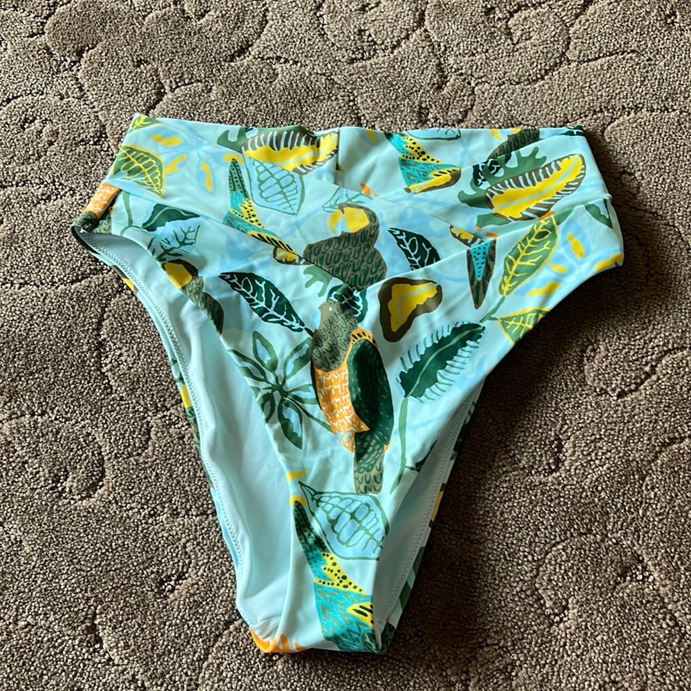 This is the bottom piece to the bikini. It’s very tropical as well and very soft